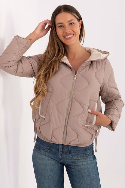 Elegant women's transitional jacket by MBM, crafted from durable polyester with insulated lining for warmth, showcasing a fashionable quilted pattern.