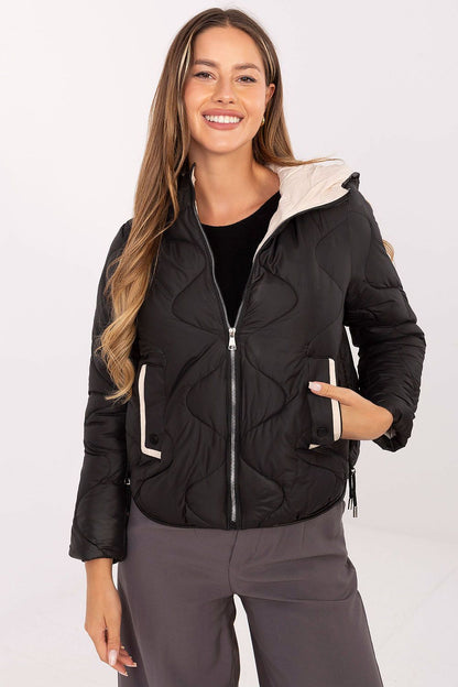 Stylish women's quilted transitional jacket with hood by MBM, showcasing a modern silhouette for autumn and winter.