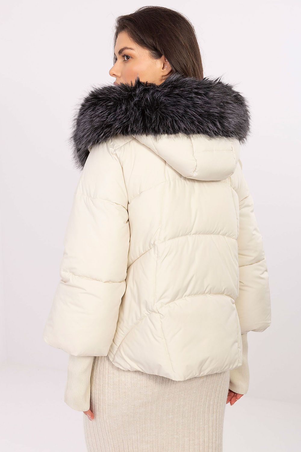 MBM Women's Quilted Down Jacket in black, model wearing with detachable fur-lined hood, demonstrating blend of comfort and sophistication for cold days.