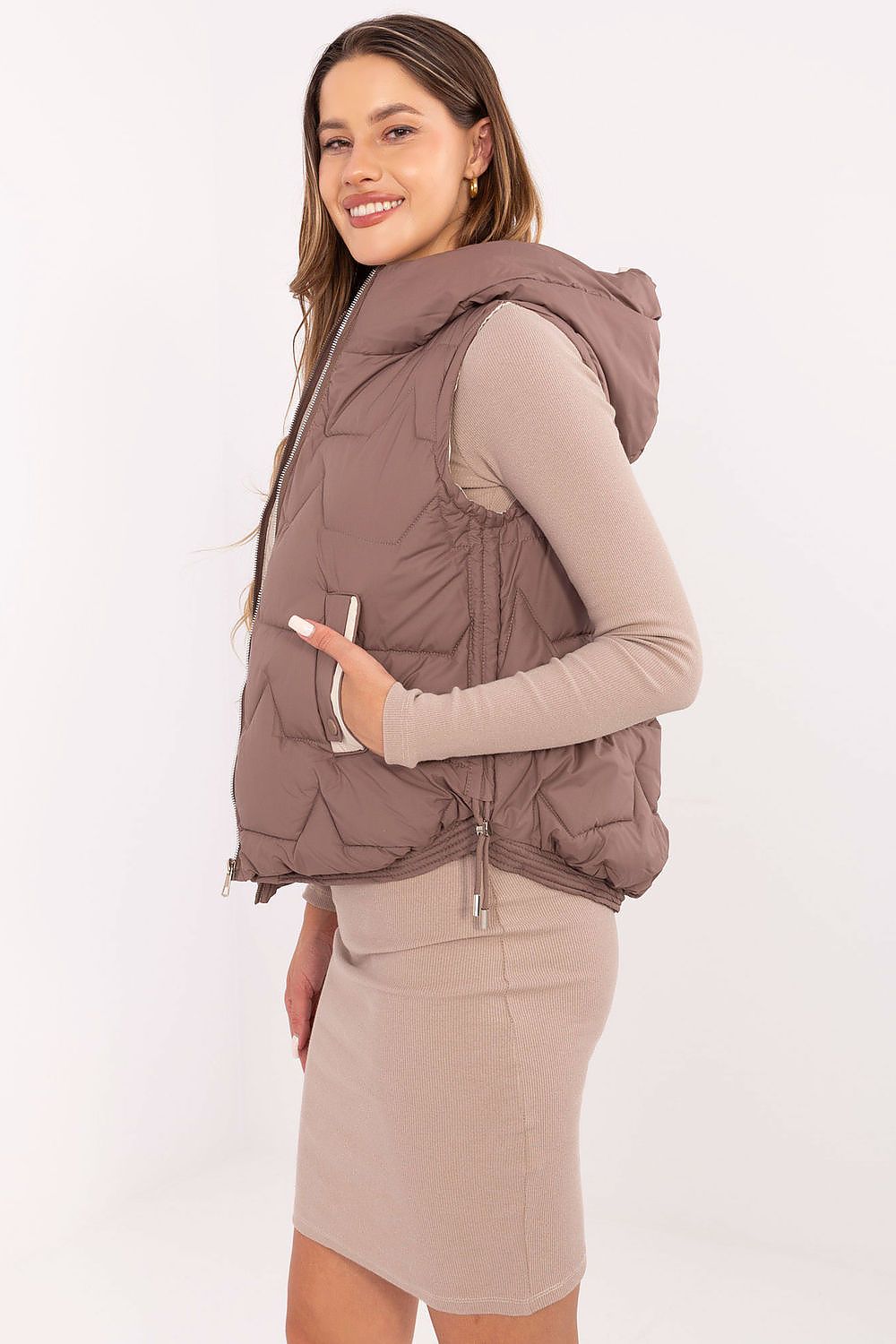 Elegant MBM Women's Down Vest featuring high-quality polyester material, designed for transitional seasons and enhanced by a fashionable quilted pattern.