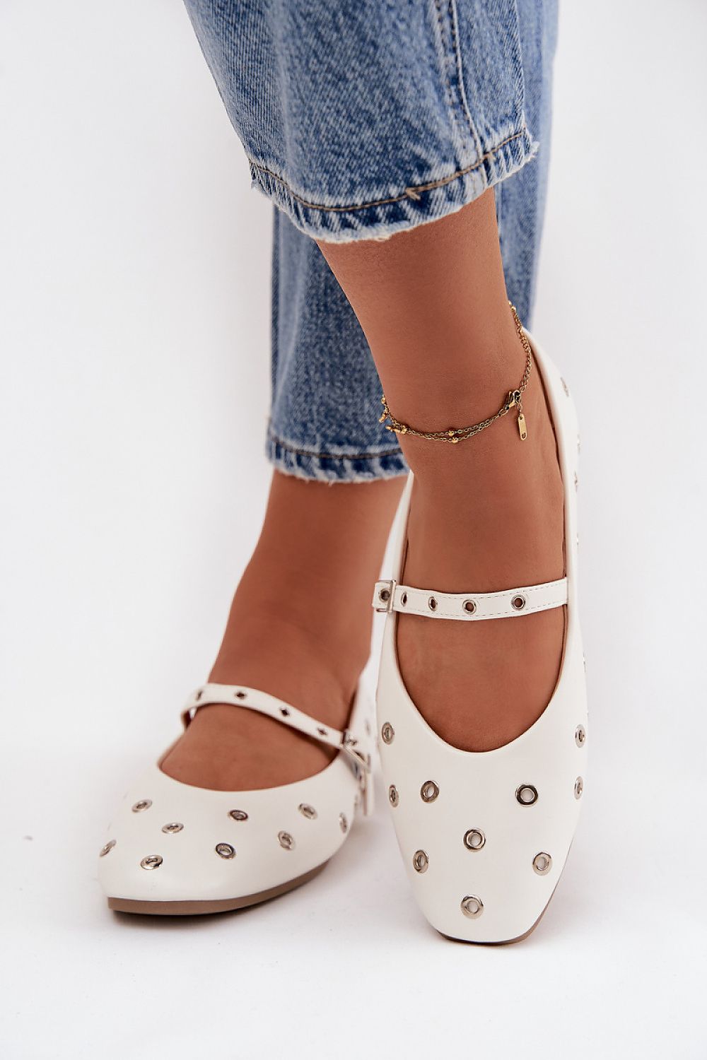 Elegant eco-leather women's ballet flats by Step in Style, featuring adjustable strap and decorative circles, perfect for versatile everyday outfits.