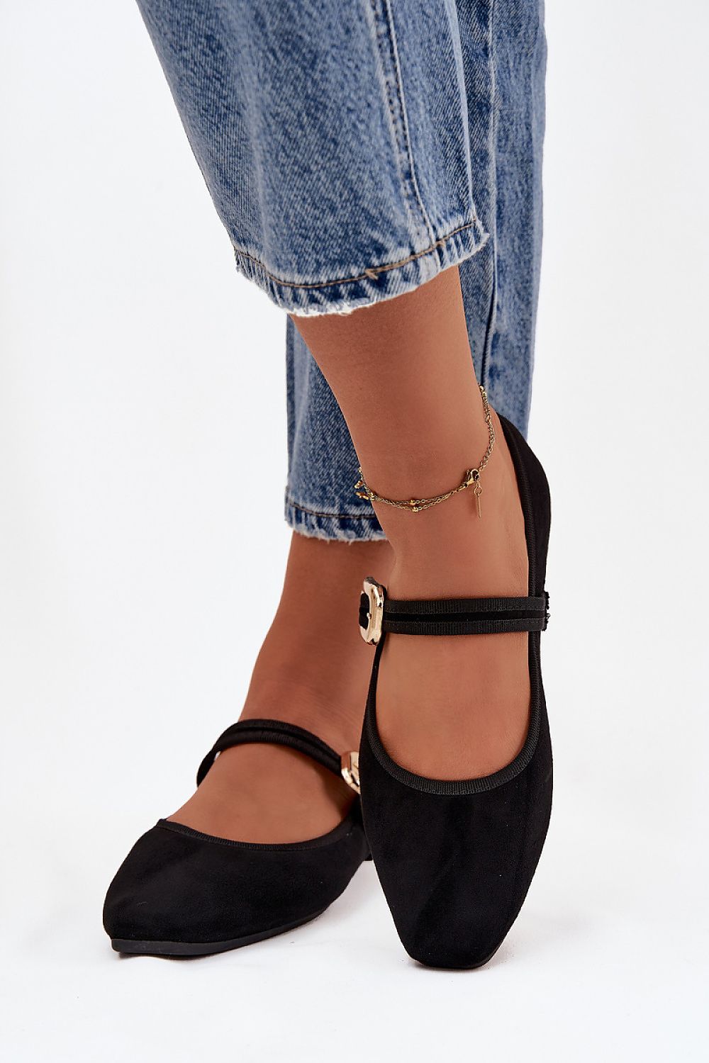 Luxurious women's ballet flats from Step in Style in eco suede with an elegant gold buckle, ideal for work and formal occasions.