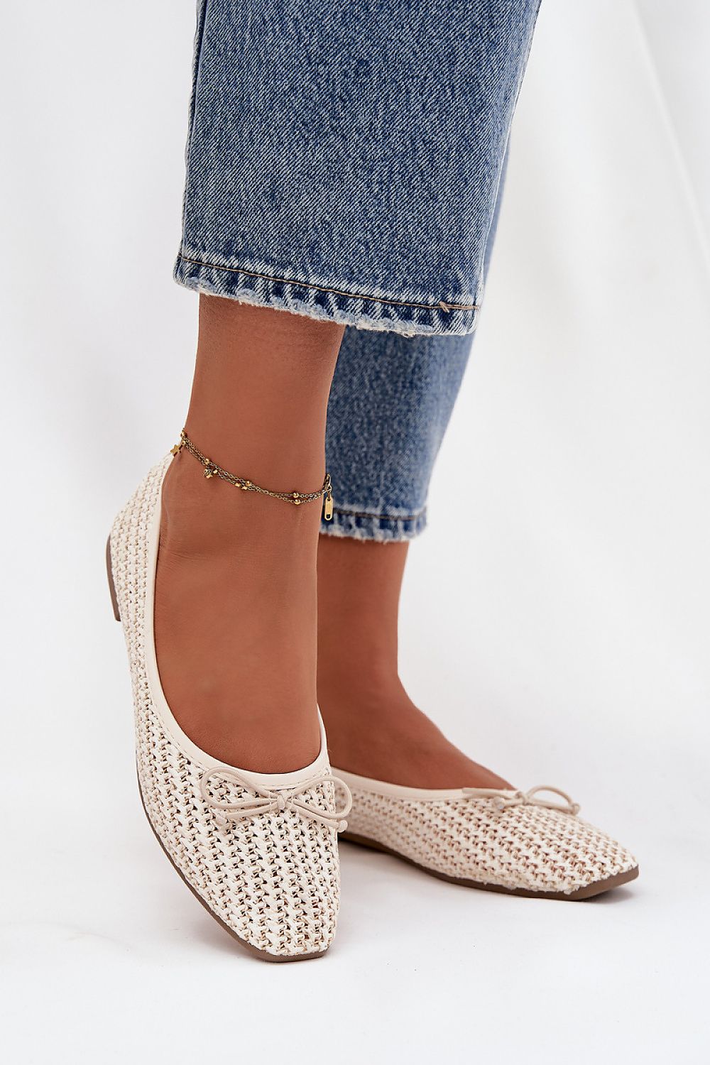 Elegant women's ballet flats with bow by Step in Style, designed in a lightweight braided material, showcasing a classic rounded toe for a luxurious look.