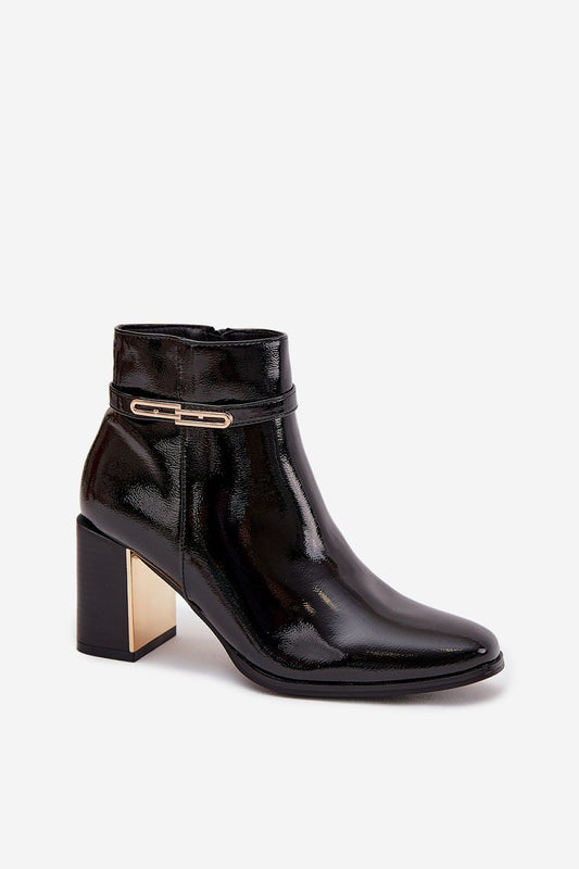 Stylish close-up of Step in Style's Women's Ankle Boots, featuring gold detailing and artificial leather for a chic look suitable for any occasion.