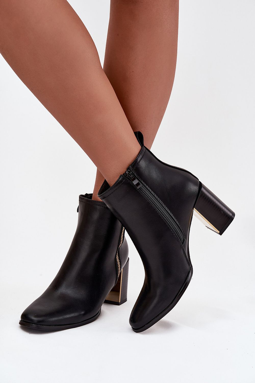 Fashionable women's eco leather ankle boots with a practical zipper and chic decorative detail by Step in Style, designed for comfort and elegance.