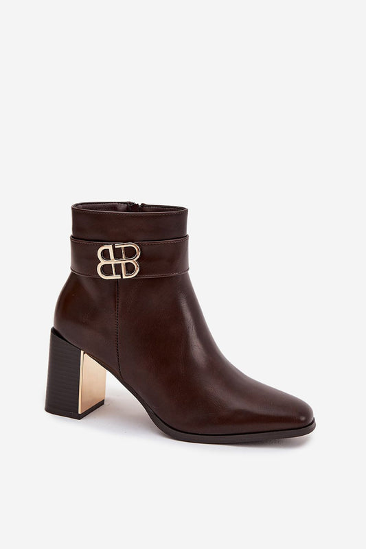 Stylish women's eco leather ankle boots from Step in Style, showcasing a decorative strap and zipper closure for a perfect fit and easy wear.