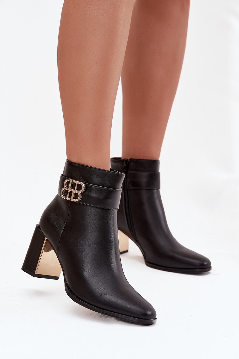 Elegant women's ankle boots in eco leather with golden accents, 7.5cm heel height, crafted by Step in Style for versatile styling.