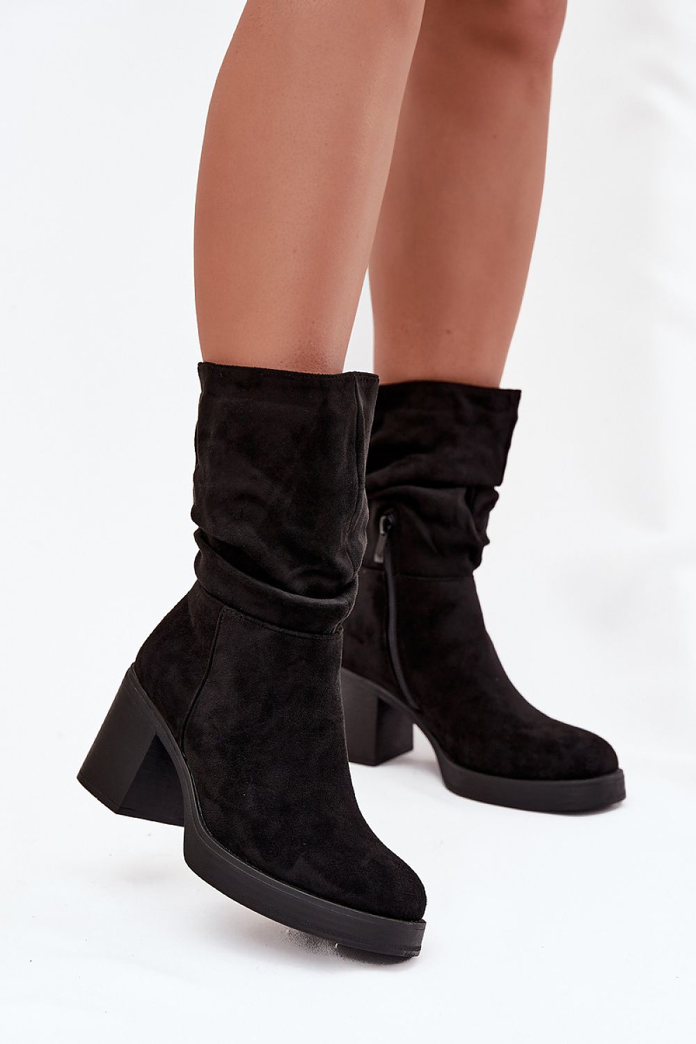 Elegant women's eco suede ankle boots by Step in Style, featuring a stylish ruched shaft and stable column heel for comfort and sophistication.
