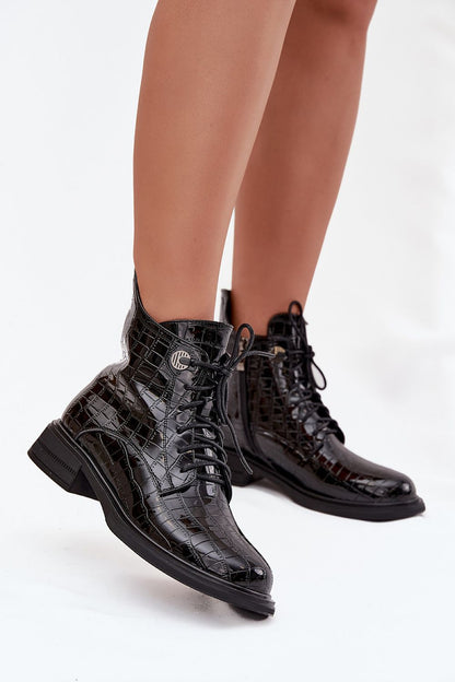Elegant women's patent leather ankle boots by Step in Style featuring a stylish lace-up fastening and secure zipper, designed for warmth and comfort during colder days, available in EU sizes 36-41.