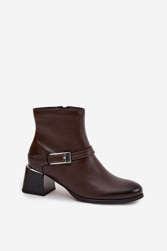 Close-up of Step in Style natural leather ankle boots for women, showcasing the stylish decorative buckle strap and luxurious felt lining for comfort and warmth.