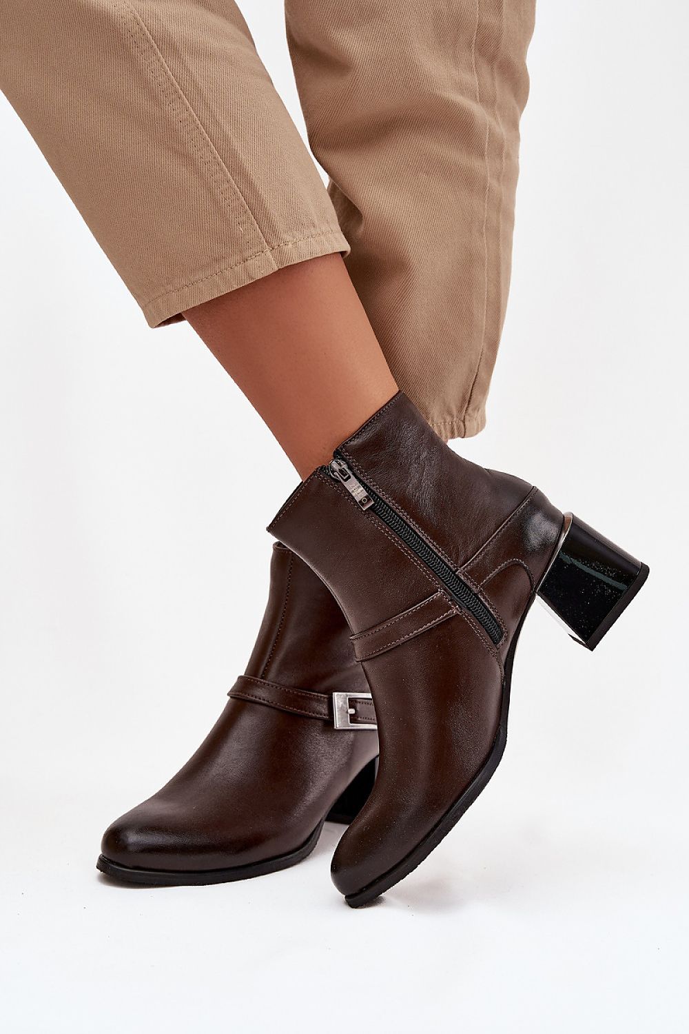 Chic women's ankle boots from Step in Style, designed in elegant natural leather with a practical zipper and a 5.5 cm heel, perfect for both casual and sophisticated outfits.