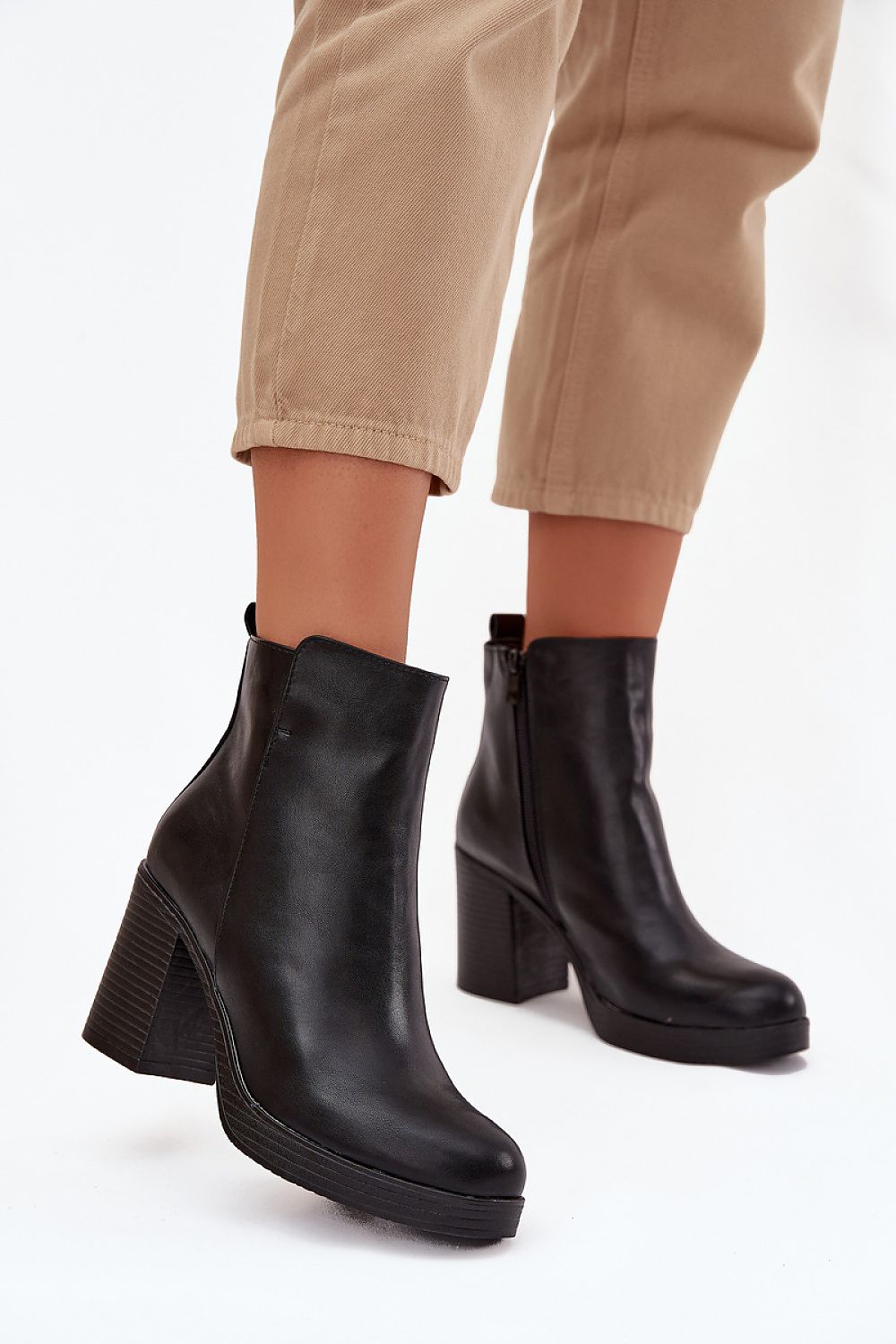 Elegant women's eco leather ankle boots by Step in Style, featuring a sophisticated 8.5cm heel and stylish side zipper for easy wear.