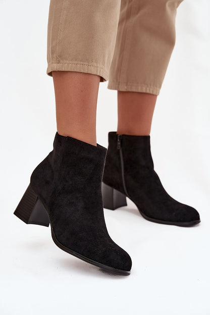 Elegant women's eco-suede ankle boots by Step in Style, featuring a classic design, stable 6.5cm heel, and zip closure, perfect for stylish winter outfits.
