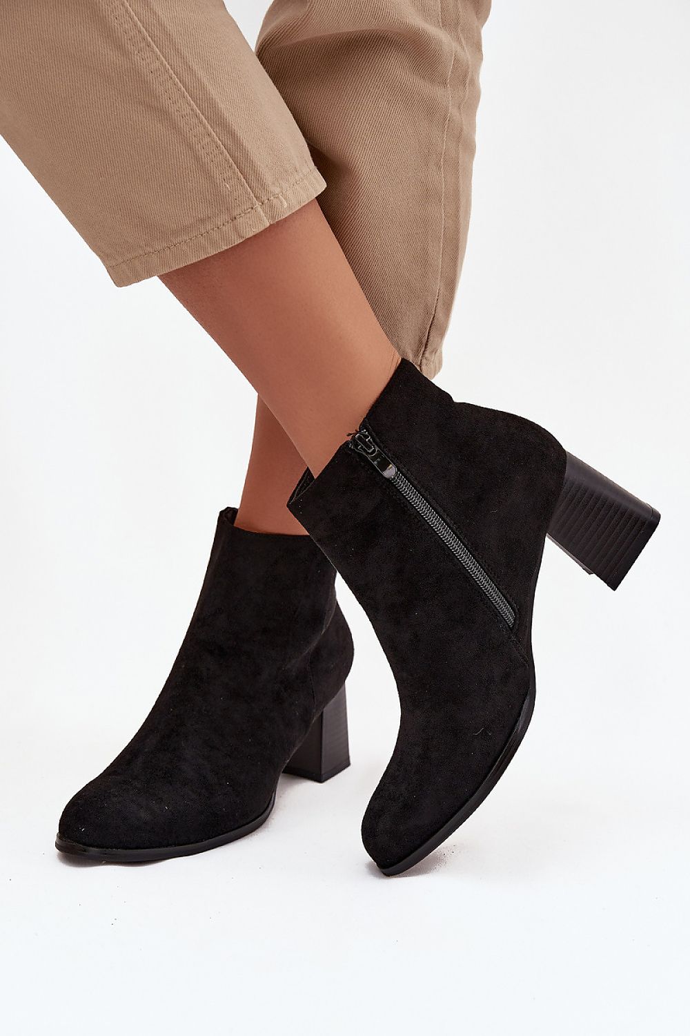 Luxurious women's ankle boots in eco-suede from Step in Style, designed for comfort and elegance with a stable heel and available in sizes EU 36-41.