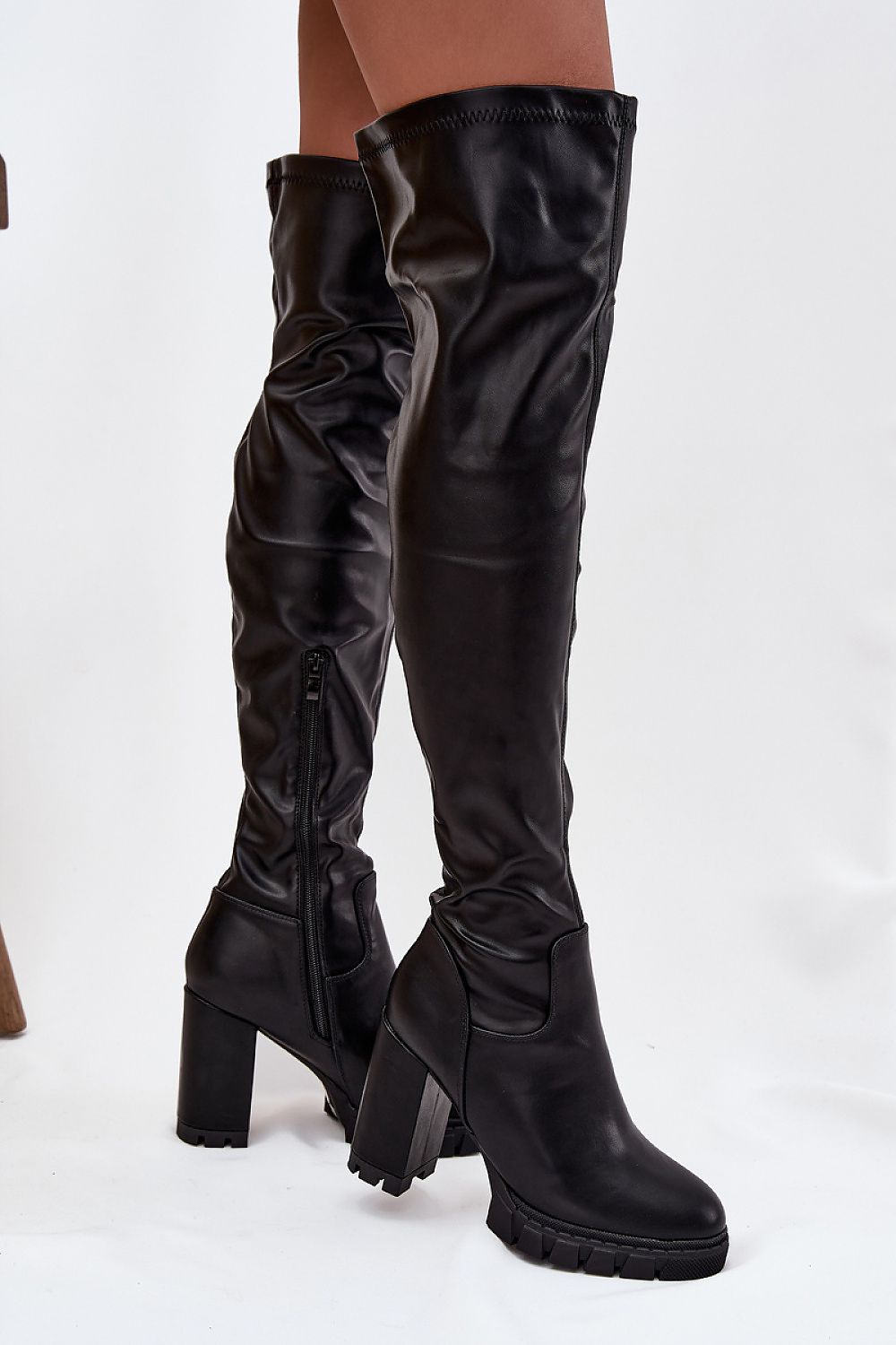 Elegant women's over-the-knee high heel boots with side zipper by Step in Style, showcasing a sophisticated design that enhances leg length and style.