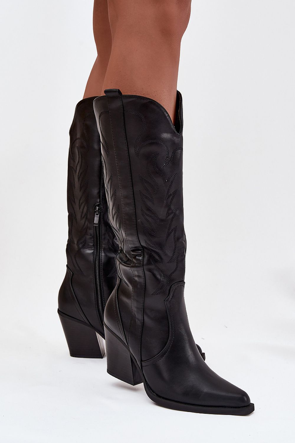 Comfortable yet glamorous Women's eco-leather cowboy boots, showcasing a cut-out column heel, perfect for a fashionable, western look, by Step in Style.