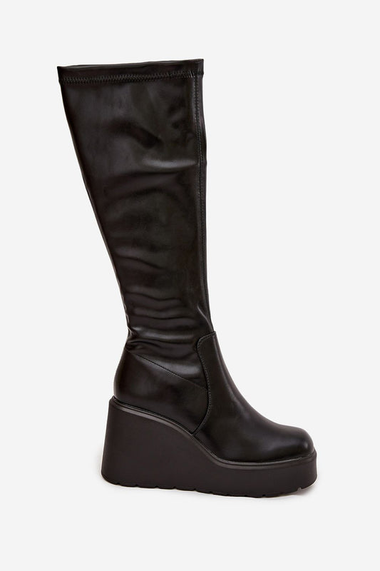 Elegant women's eco-leather buskin boots by Step in Style, featuring a stylish wedge heel and a practical zipper for easy wear, perfect for fashionable cold weather.