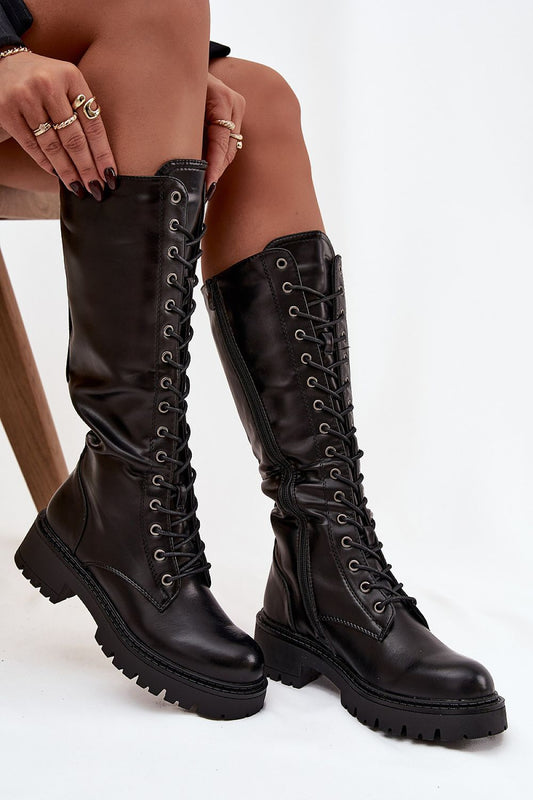Women's Eco Leather Thigh-High Combat Boots with Zipper & Lacing by Step in Style, showcasing a luxurious design that blends comfort and bold fashion.