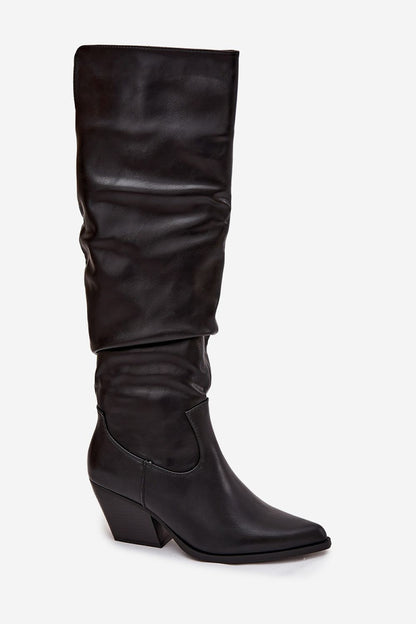 Close-up view of Step in Style's Elegant Women's Thigh-High Cowgirl Boots showcasing the luxurious eco leather material, pointed toes, and detail of the zipper for easy wear.