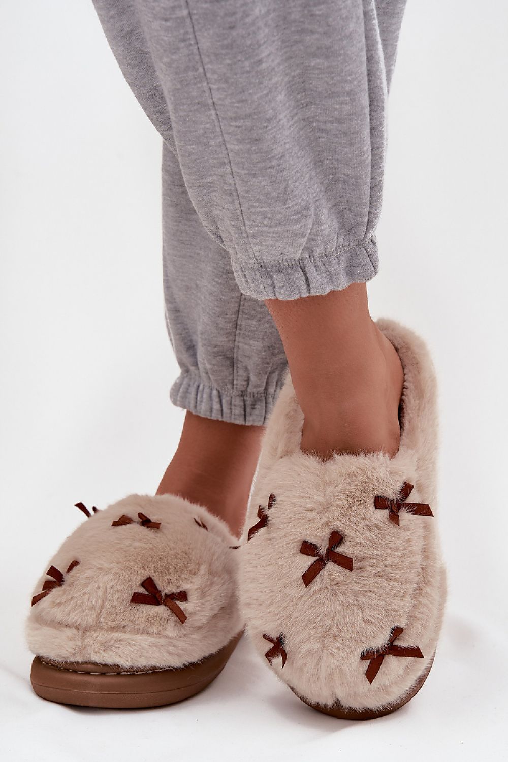 Luxury women's fur slippers with thick sole and bow details by Step in Style, designed for elegant comfort at home in sizes EU 36-43.