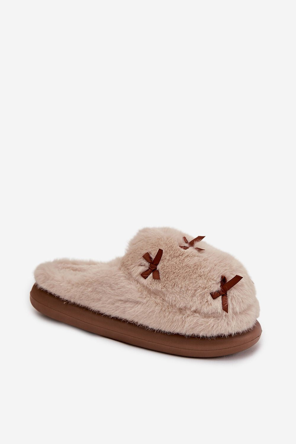 Plush fur slippers adorned with bows, designed by Step in Style, perfect for stylish home comfort and cosy wear.