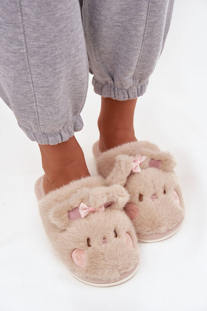 Luxurious women's bunny motif fur slippers designed by Step in style, featuring soft fluffy material, a charming bow and ears, ideal for keeping feet warm and stylish.