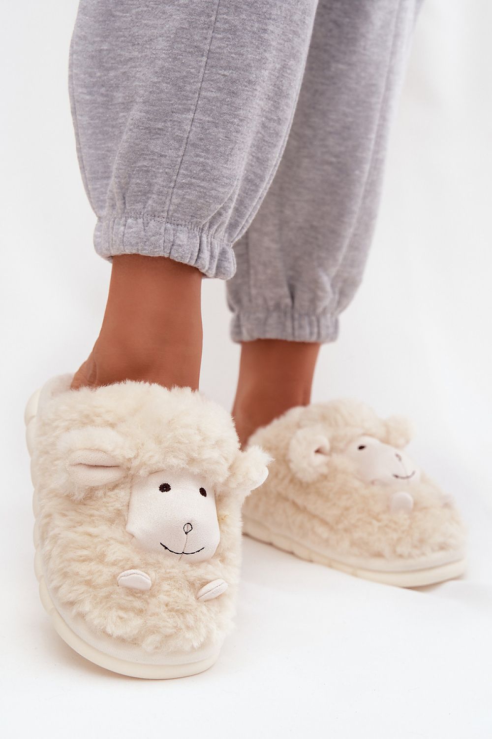 Luxury women's fur slippers featuring an adorable sheep motif by Step in Style, perfect for cozy days at home.