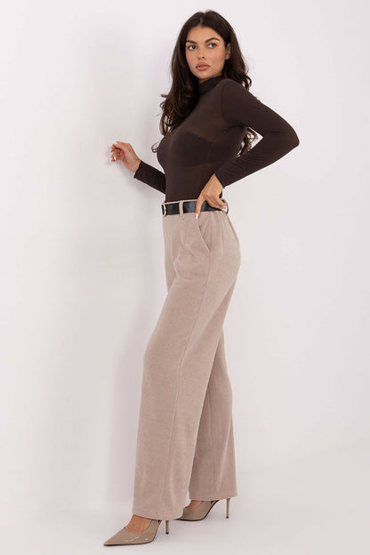 Side view of Italy Moda's luxurious high waist wide leg corduroy trousers for women, showcasing elegant pockets and a refined silhouette.