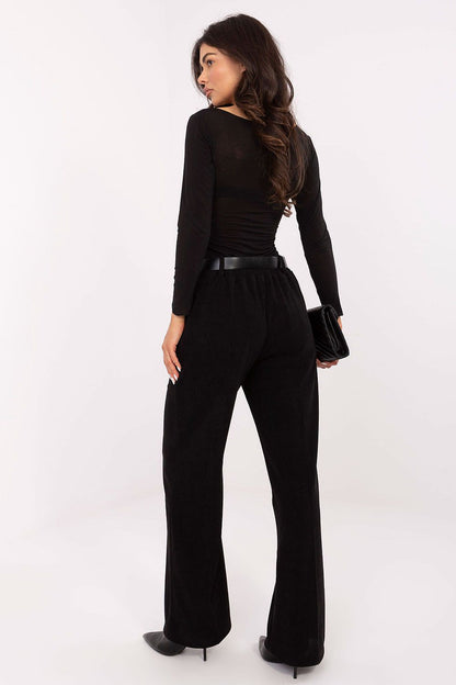 Model wearing Elegant Women's Wide Leg Corduroy Trousers from Italy Moda, demonstrating the exquisite fit and fashionable silhouette in a casual outfit.