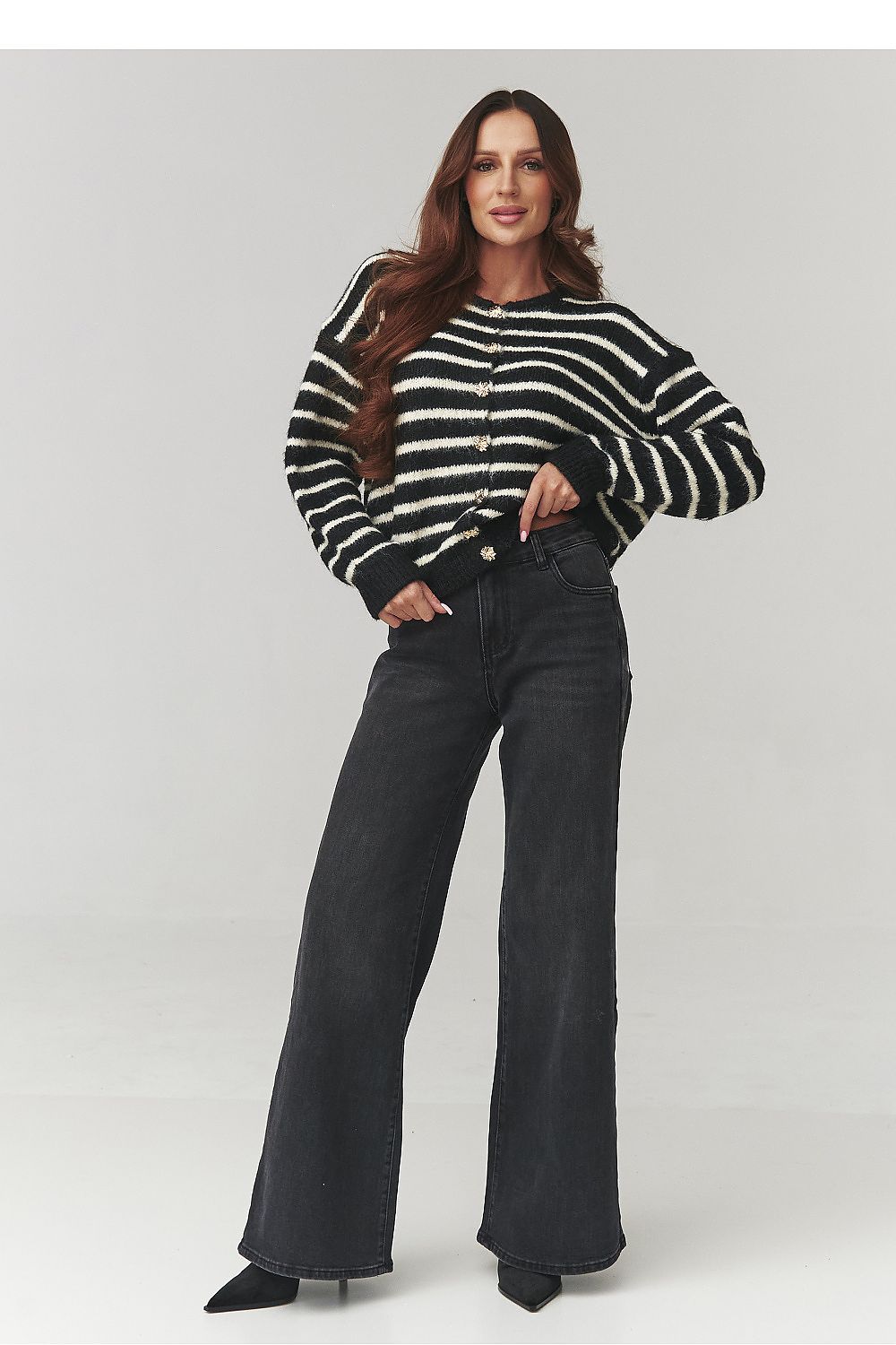 Luxury women's striped cardigan by Makadamia, featuring a soft knit design with elegant decorative buttons.