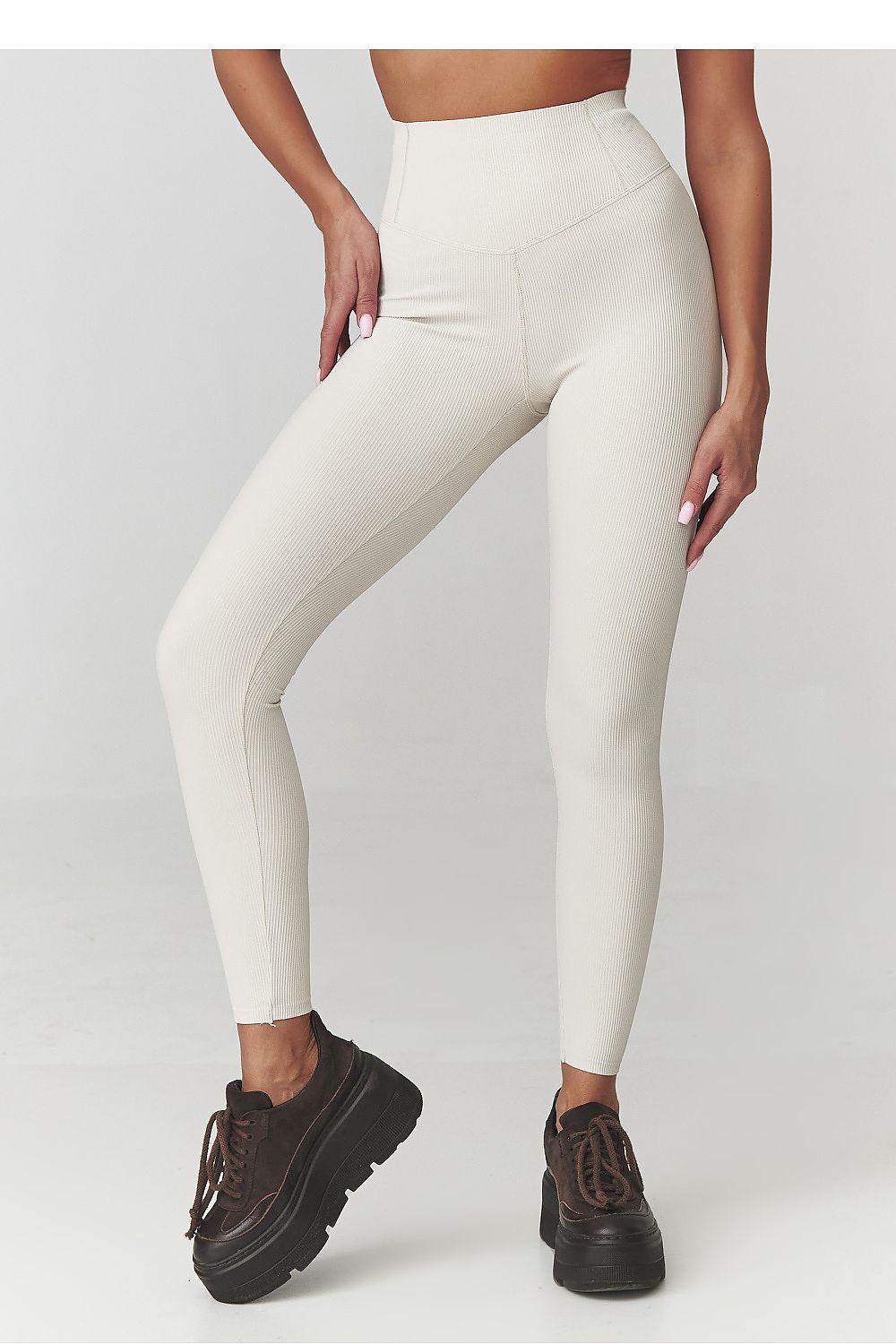 Luxury long ribbed leggings by Makadamia, designed for women, featuring a high waist and comfort fit ideal for workouts and casual wear.