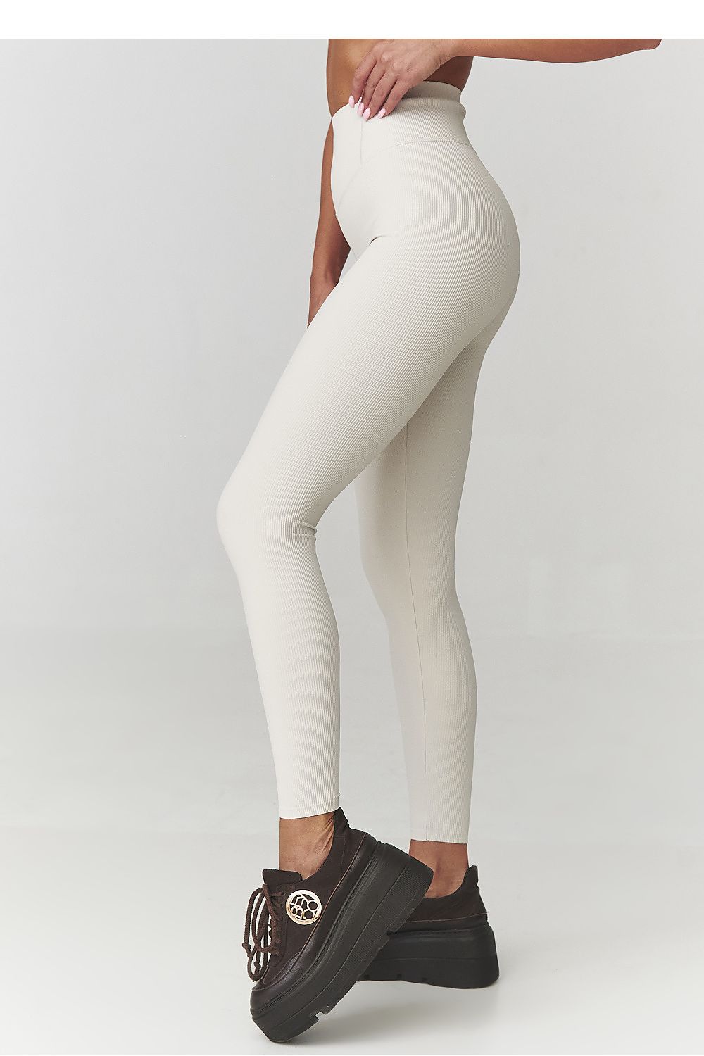 Stylish women's long ribbed leggings by Makadamia in high waist design, offering a flattering fit for EU sizes 36-42.
