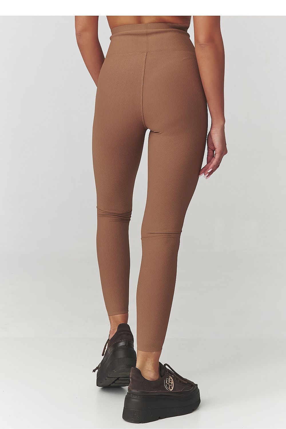 Makadamia luxury women's leggings styled for casual activities, showcasing their versatile high waist design.