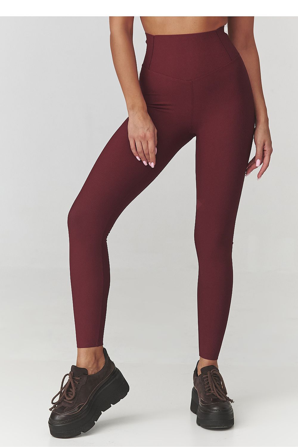 Stylish women's long ribbed leggings by Makadamia, featuring a flattering fit ideal for casual outings or gym wear.