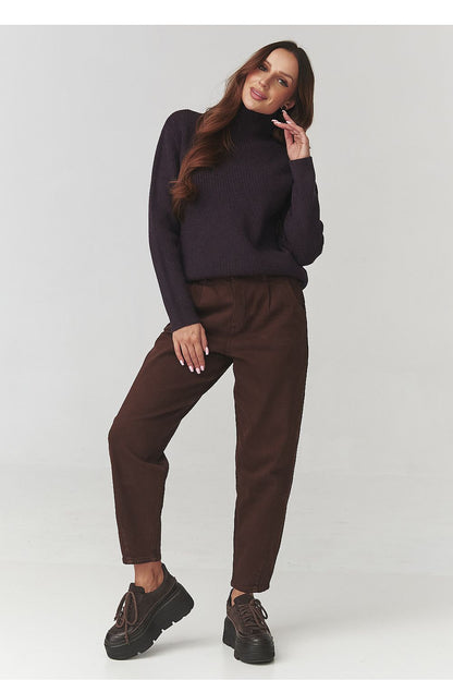 Makadamia women's turtleneck sweater in a loose cut, perfect for a versatile wardrobe essential for cooler seasons.