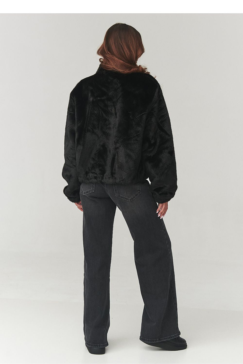 Stylish mocha eco fur jacket designed by Makadamia, highlighting its warm fabrics and flattering fit, ideal for everyday elegance.