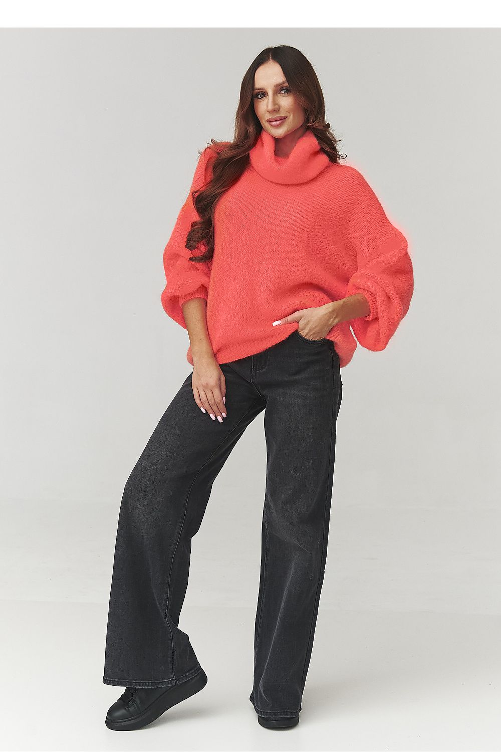 Makadamia Oversized Turtleneck Sweater for Women displayed elegantly, showcasing its stylish knit design perfect for cooler days.