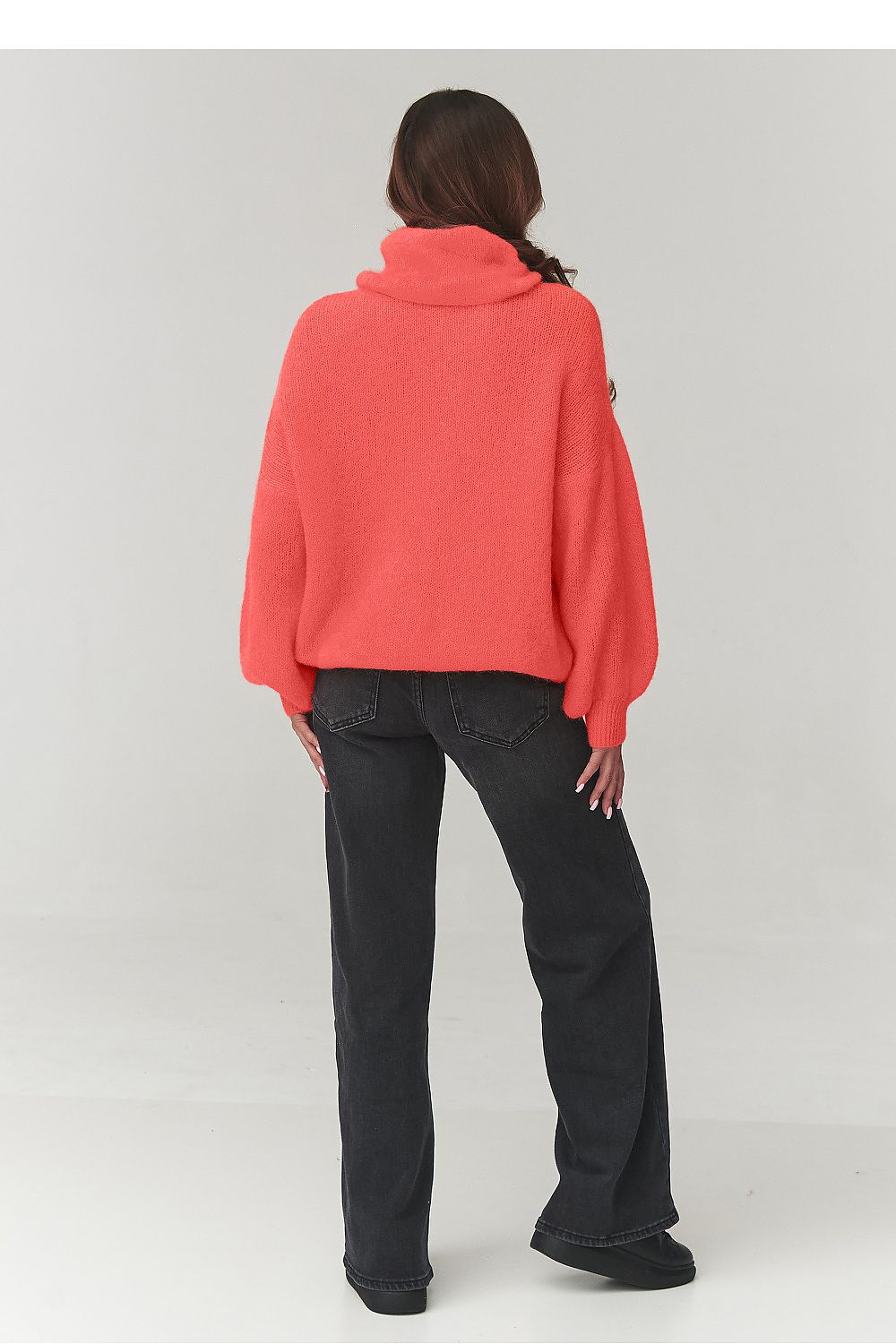 Fashionable Makadamia women's oversized turtleneck, artfully draped to create a chic silhouette, ideal for casual and formal occasions.