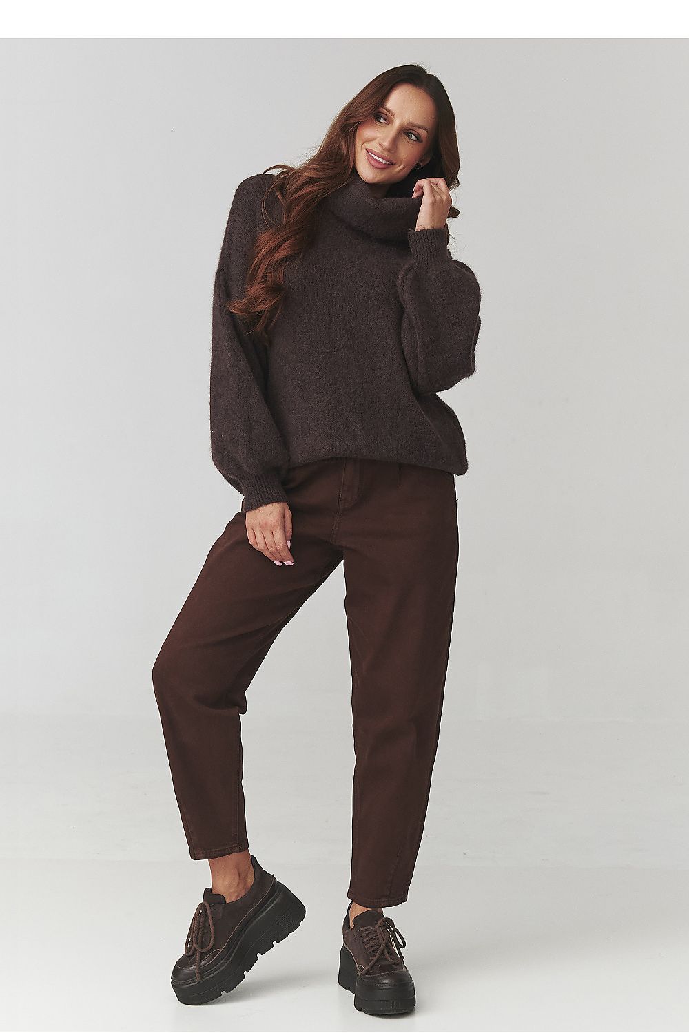 Elegant Makadamia women's sweater showcasing the relaxed silhouette and wide sleeves, ideal for a sophisticated attire.