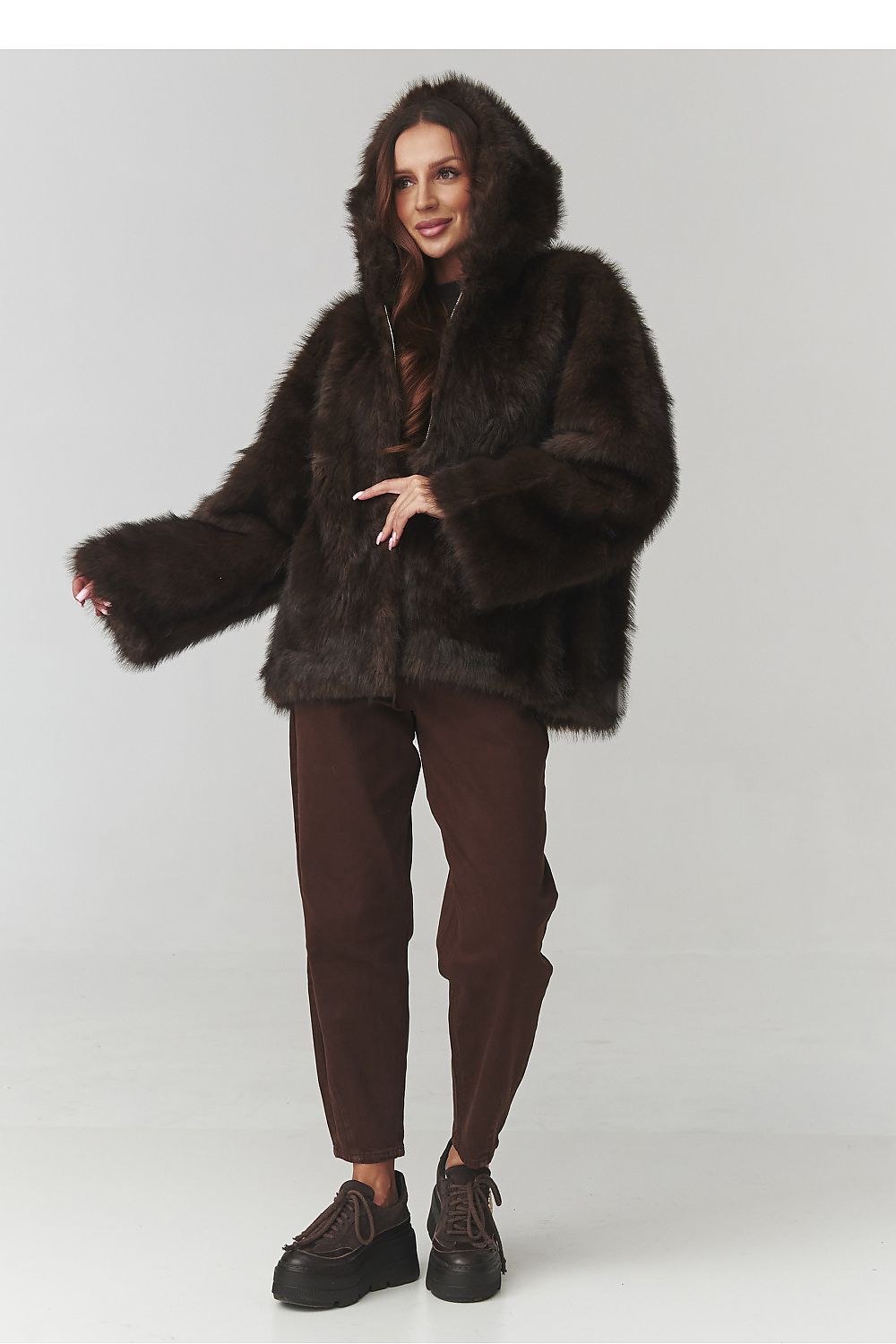 Chic and sophisticated brown Luxury Women's Faux Fur Hooded Jacket by Makadamia, perfect for autumn fashion.
