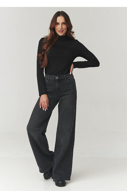 Close-up of the high-quality material of the Women's Turtleneck Blouse by Makadamia, highlighting its comfortable fit and elegant design.