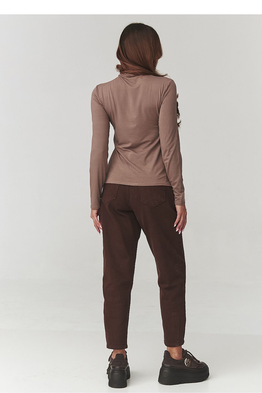 Elegant Women's Turtleneck Blouse by Makadamia, showcasing the soft and luxurious fabric ideal for stylish layering.