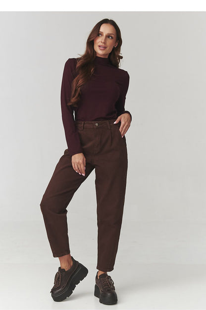 Close-up view of the soft, comfortable fabric of the Makadamia turtleneck blouse, featuring an elegant silhouette for timeless style.