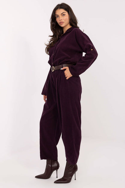Fashionable women's trousers with wide legs and a chic belt accent, crafted by Italy Moda for modern everyday wear.