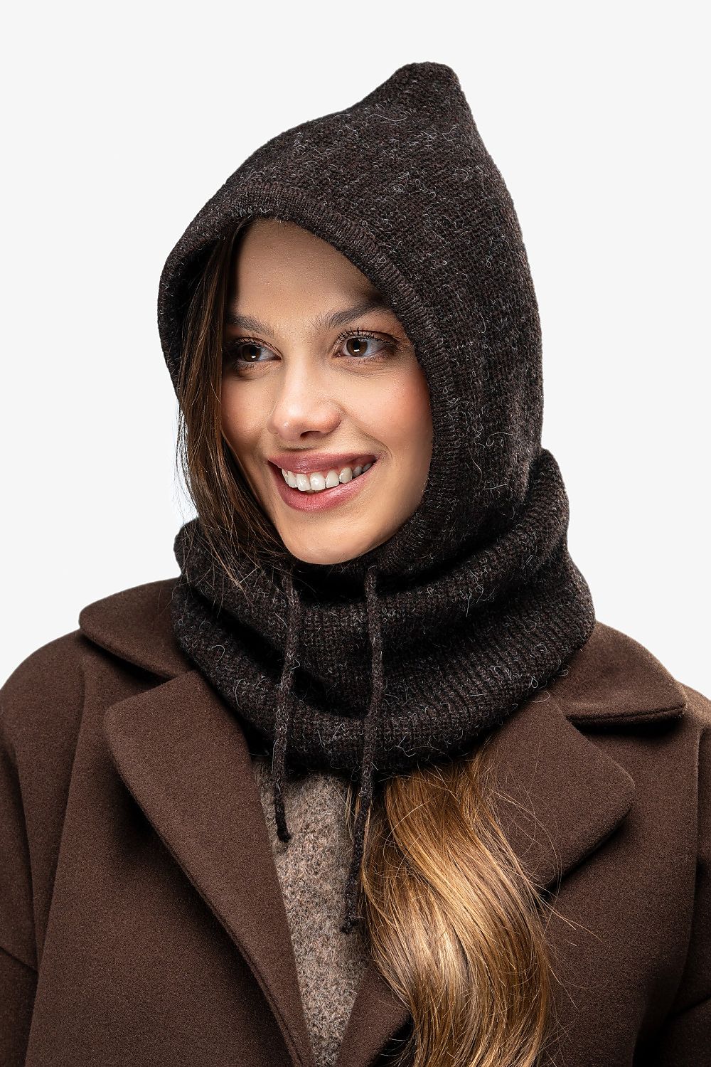 Luxury Awama Balaclava Neck Warmer Hat in an elegant setting, perfect for winter excursions, showcasing minimalist style and exceptional warmth.