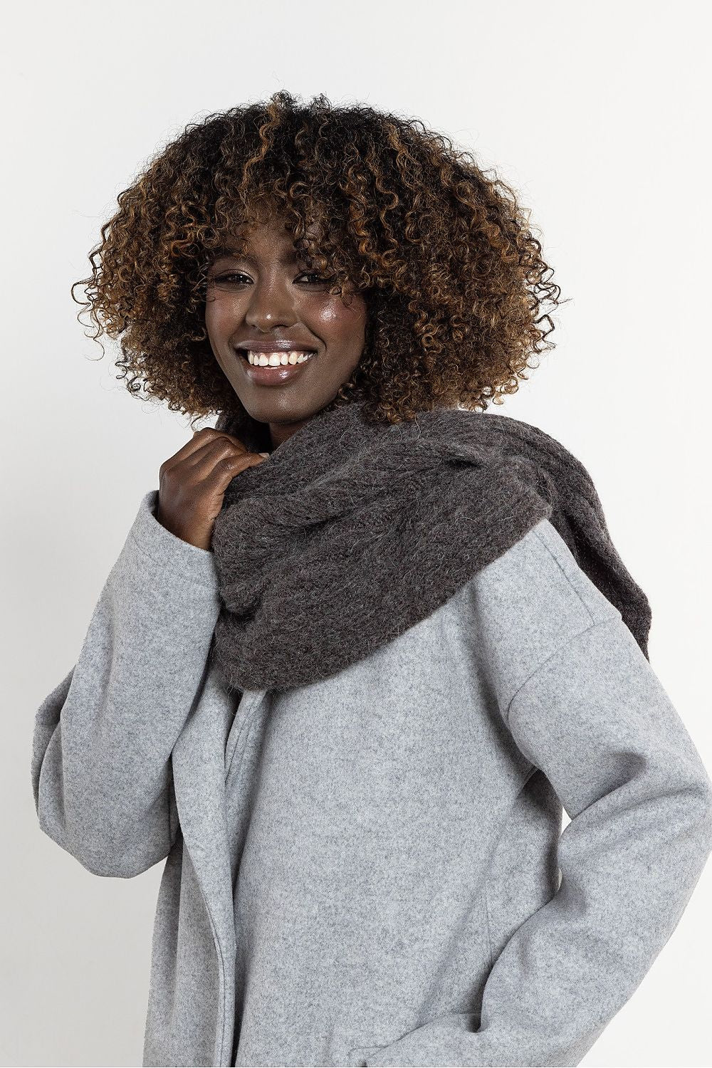 Luxurious kid mohair and wool long scarf by Awama, showcasing a soft and warm texture, perfect for winter elegance.