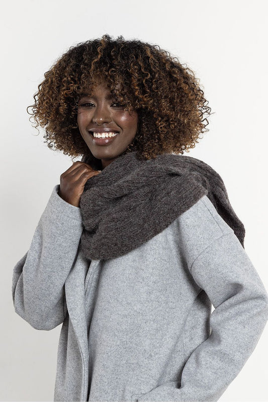 Luxurious kid mohair and wool long scarf by Awama, showcasing a soft and warm texture, perfect for winter elegance.