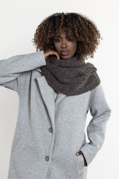 Warm and fluffy kid mohair and wool scarf from Awama, highlighting its ribbed design ideal for layering in cold weather.