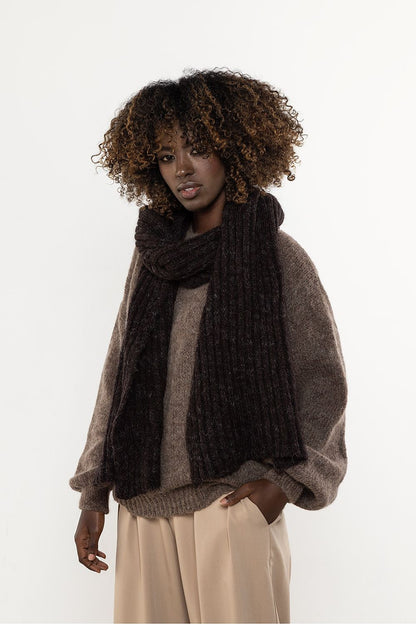 Chic kid mohair and wool long scarf from Awama, perfect for both everyday and elegant outfits in winter.