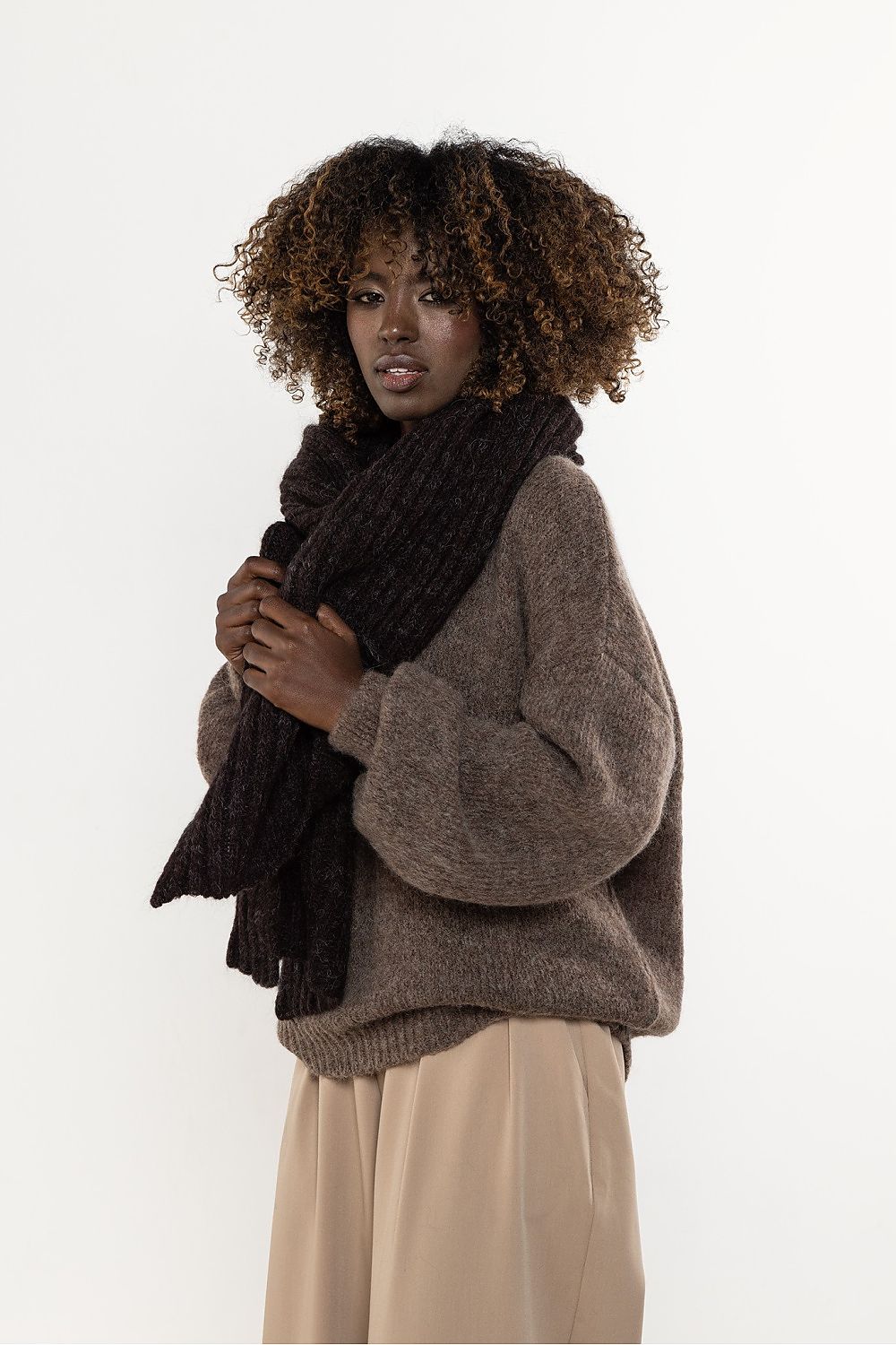 Soft long scarf made from kid mohair and wool by Awama, demonstrating luxury, warmth, and versatility for winter wear.